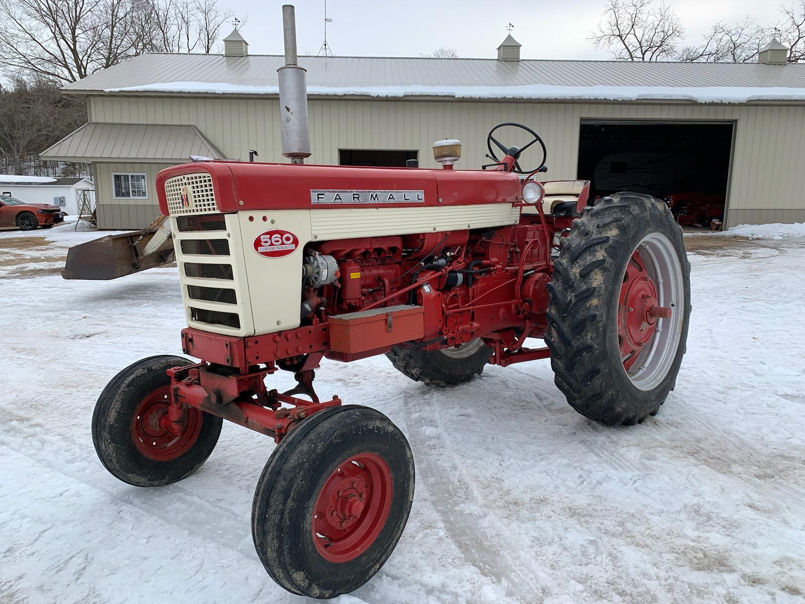 Farmall 560 Diesel, wide front, belt pulley, fast hitch, owner states “approximately 5,800 hours - h