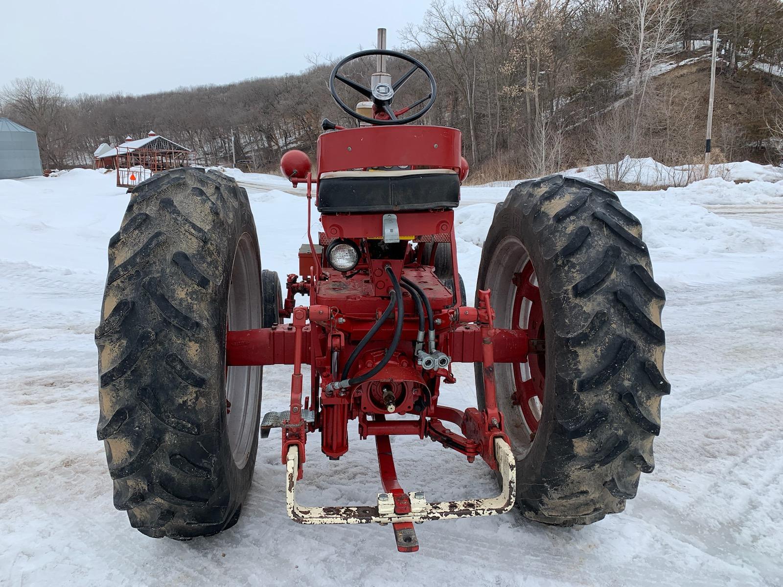 Farmall 560 Diesel, wide front, belt pulley, fast hitch, owner states “approximately 5,800 hours - h