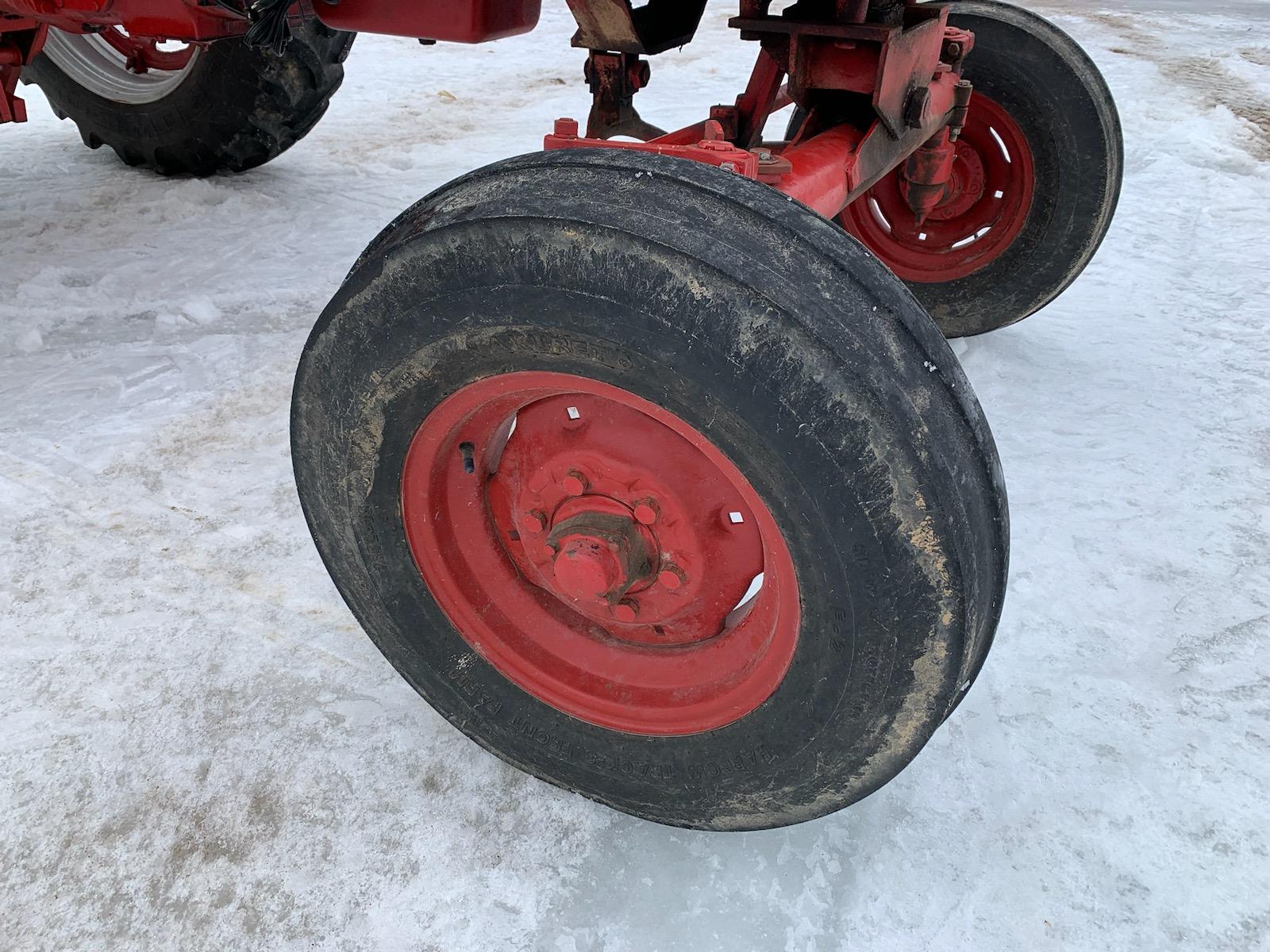 Farmall 560 Diesel, wide front, belt pulley, fast hitch, owner states “approximately 5,800 hours - h