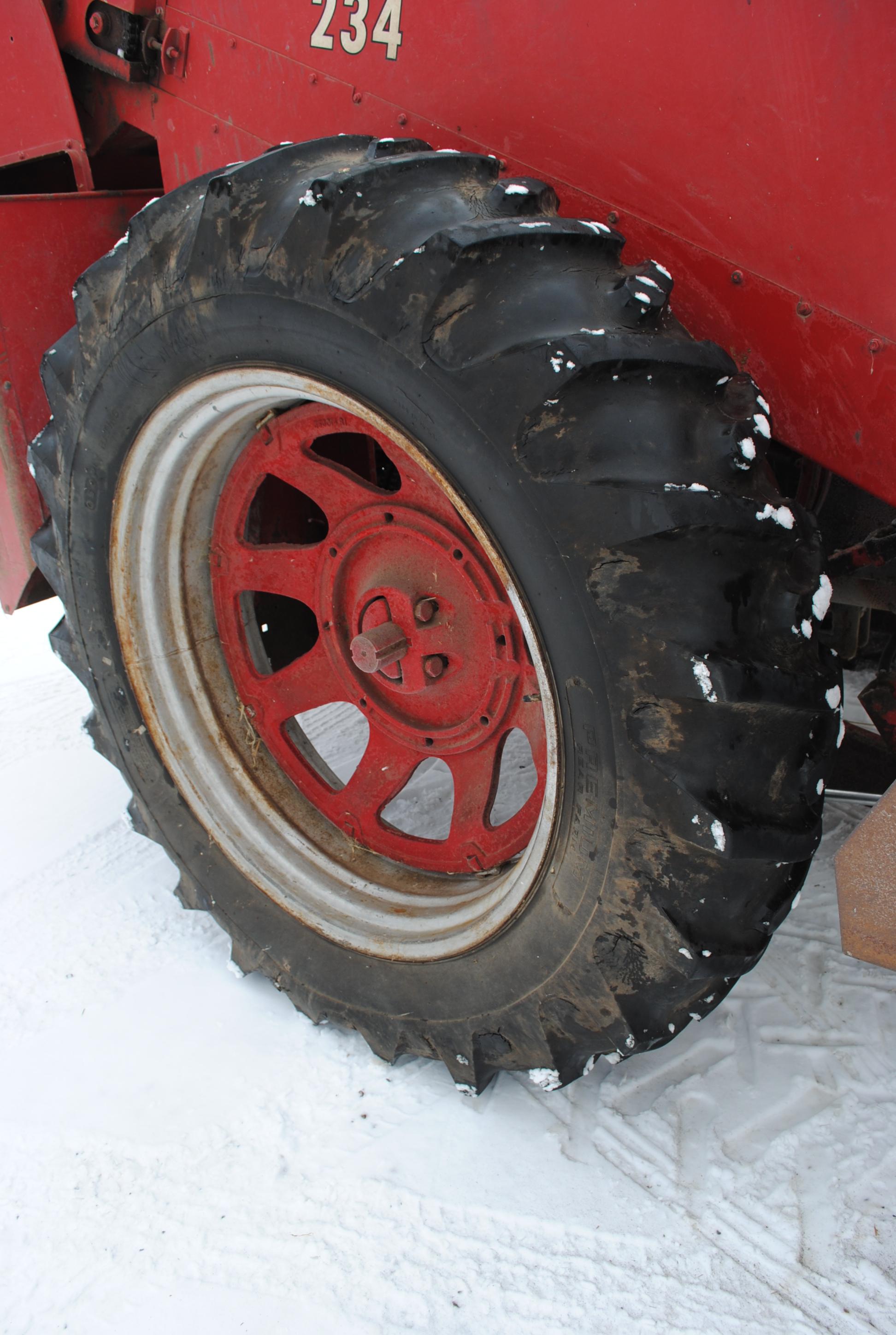 Farmall 400 Gas Tractor with International 234 Mounted 2-row picker, foam filled tricycle front tire