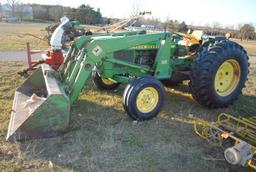 John Deere 1530 diesel tractor with John Deere 145 loader that has 7' bucket, wide front, 2 hydrauli