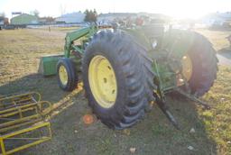 John Deere 1530 diesel tractor with John Deere 145 loader that has 7' bucket, wide front, 2 hydrauli