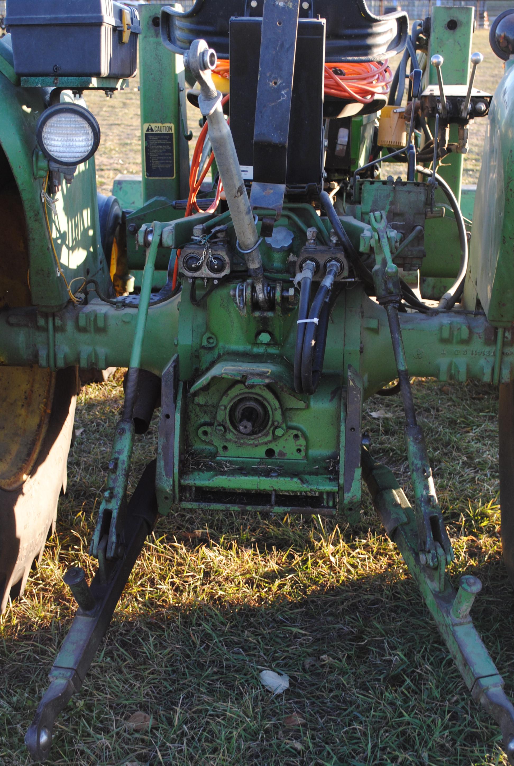 John Deere 1530 diesel tractor with John Deere 145 loader that has 7' bucket, wide front, 2 hydrauli