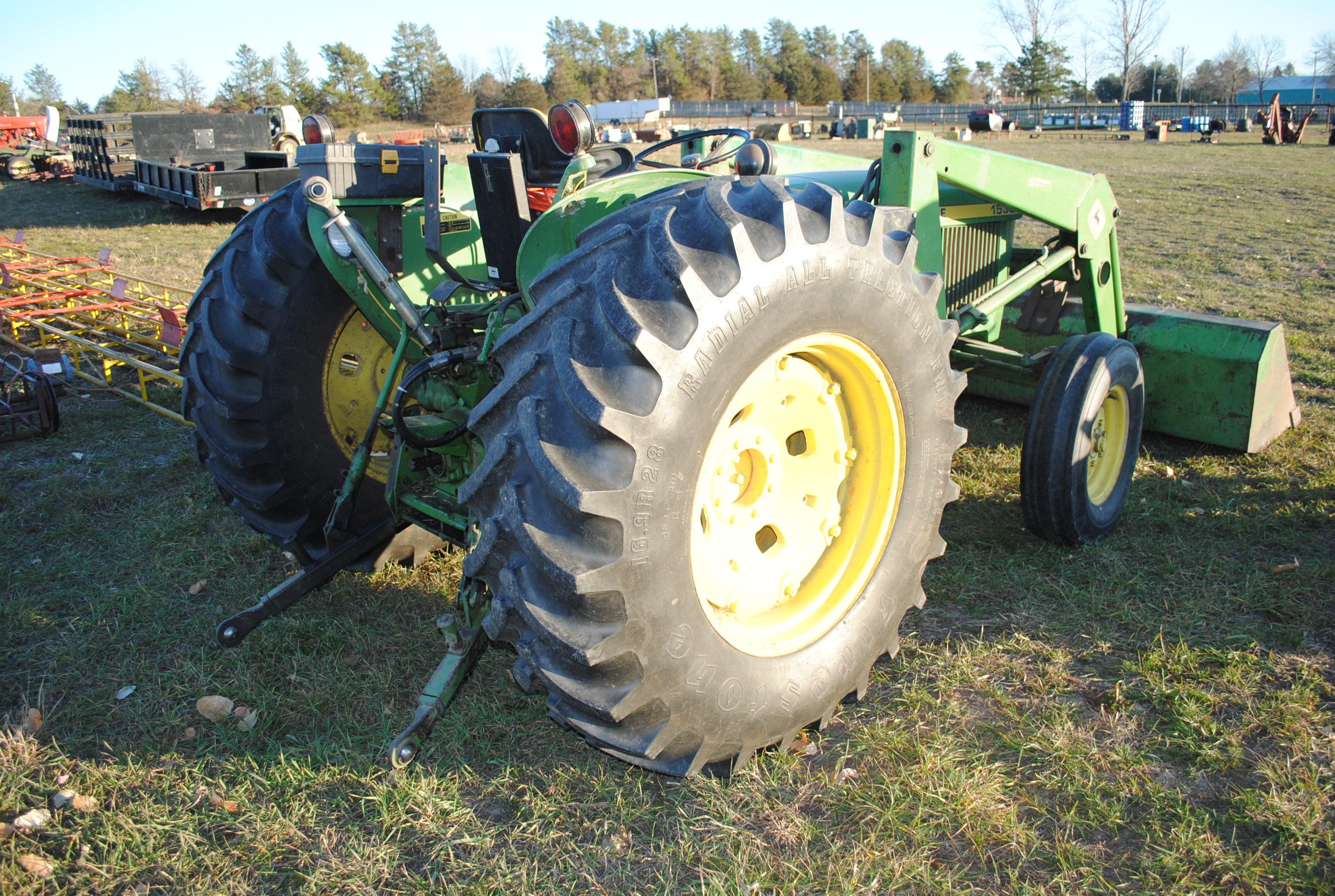 John Deere 1530 diesel tractor with John Deere 145 loader that has 7' bucket, wide front, 2 hydrauli