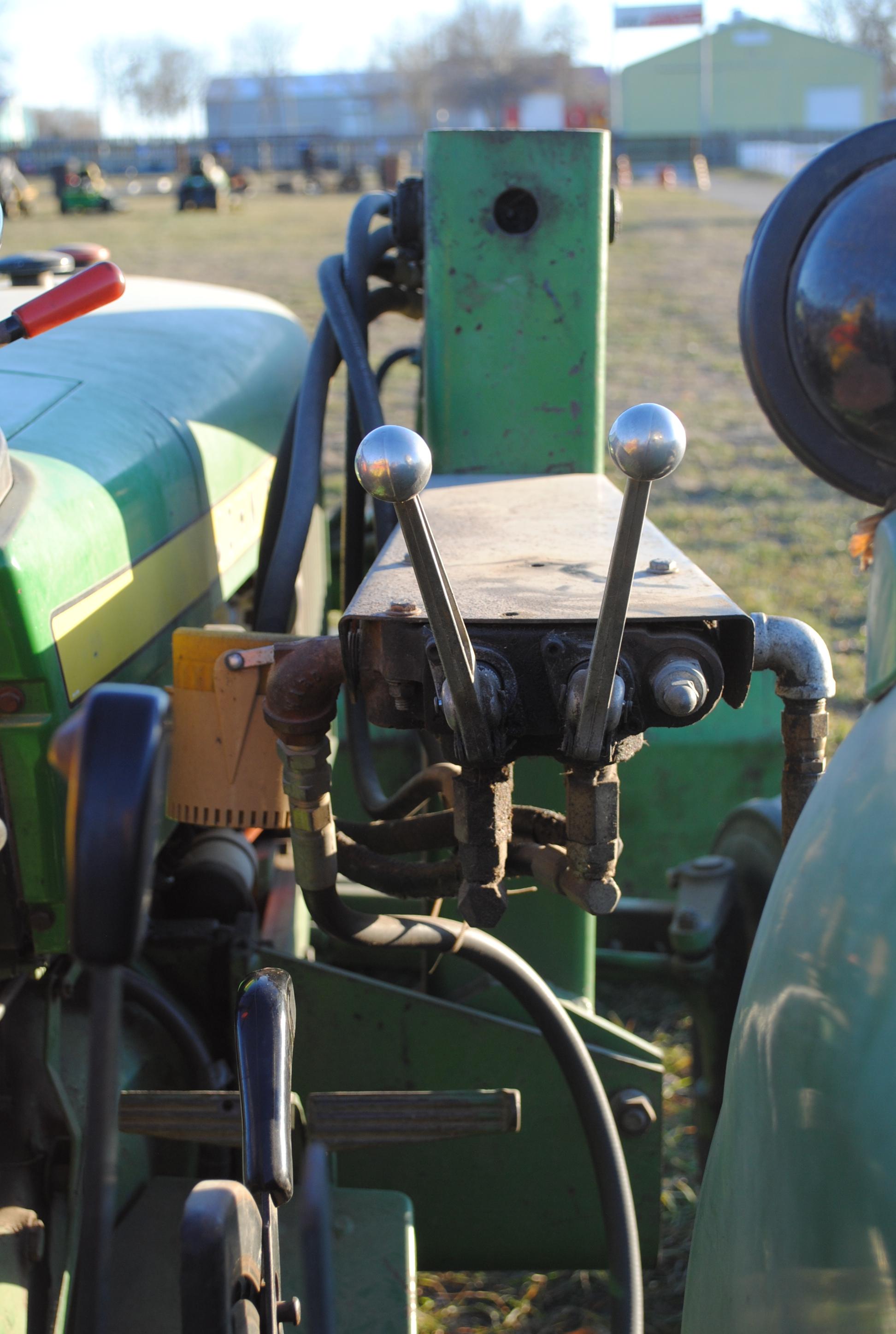 John Deere 1530 diesel tractor with John Deere 145 loader that has 7' bucket, wide front, 2 hydrauli