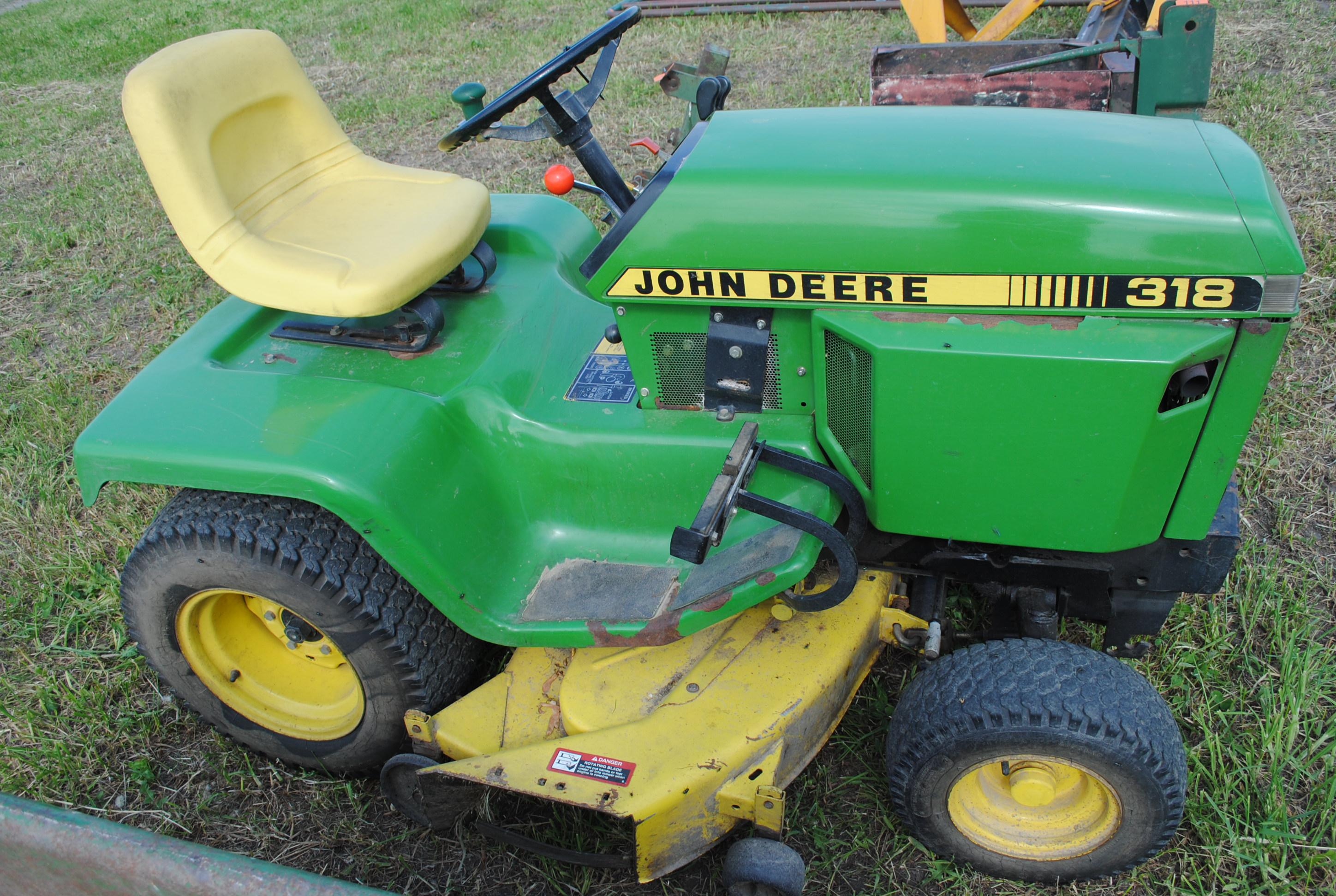 John Deere 318 mower with 50" deck, hydraulics plumbed to front, rear lift, hydraulic lift, runs & d