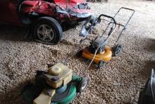 Pair of lawn mowers including Poulan Pro & green mower, condition unknown