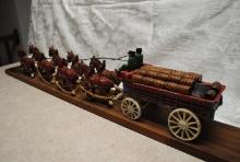 Cast Iron 8-Horse Hitch with Wagon & 2 men, mounted on 4.5" wide board and measures approx. 40" long