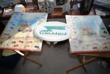 (3) Signs including oval "Kiddie Car Classics" tin front/cardboard back stand-up sign, and (2) 1956
