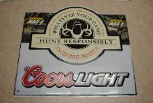 "Coors Light" stamped tin sign that says "Hunt Responsibly", measures approx. 23.5" by 20.75", some