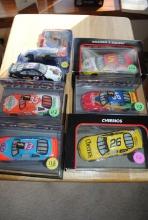 7 pieces in flat including: 1:43 scale die cast "Hot Wheels Racing #5 Hendrick Motorsports Chevy Mon