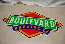 "Boulevard Brewing Co." stamped tin sign, measures approx. 22" by 11.75", small dent on top
