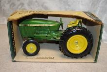 Ertl 1:16 scale die cast "John Deere Utility wide front tractor" in box