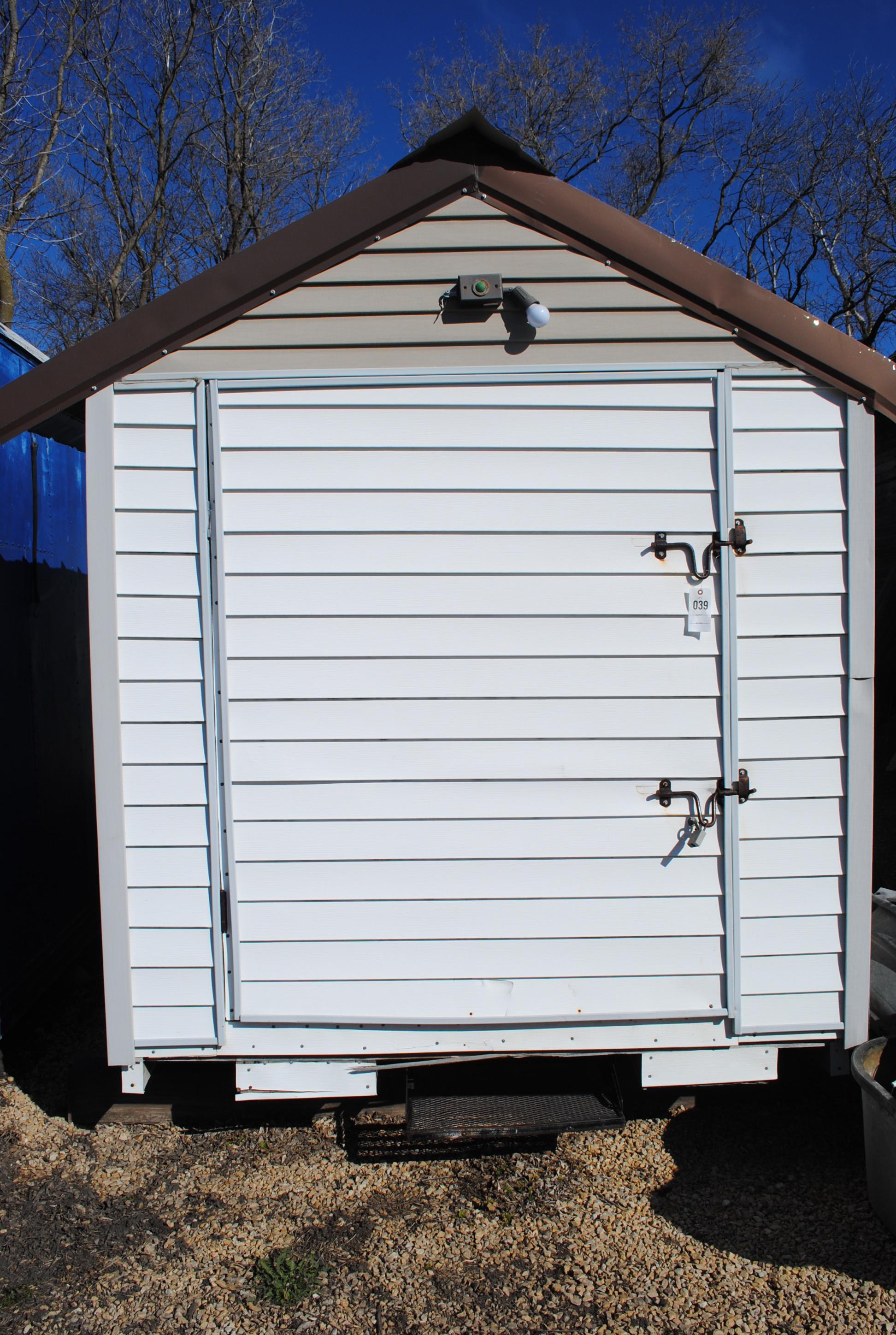 White Vinyl Sided Shed approx. 13'x7' with door on one end. Buyer is responsible for removal.