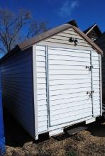 White Vinyl Sided Shed approx. 13'x7' with door on one end. Buyer is responsible for removal.