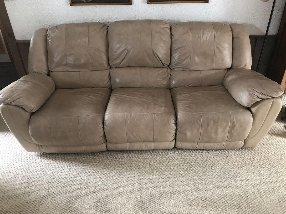 Reclining leather sofa