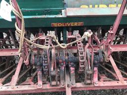 Oliver 12' grain drill with grass attachment, 6" spacing on steel wheels. Excellent condition.