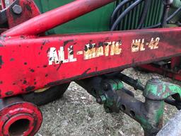 Westendorf WL-42 All-matic loader with Quick-tach bucket. Mounting brackets fit John Deere 4020.