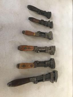 6 - Antique pipe wrenches 1 advertised John Deere and Co.