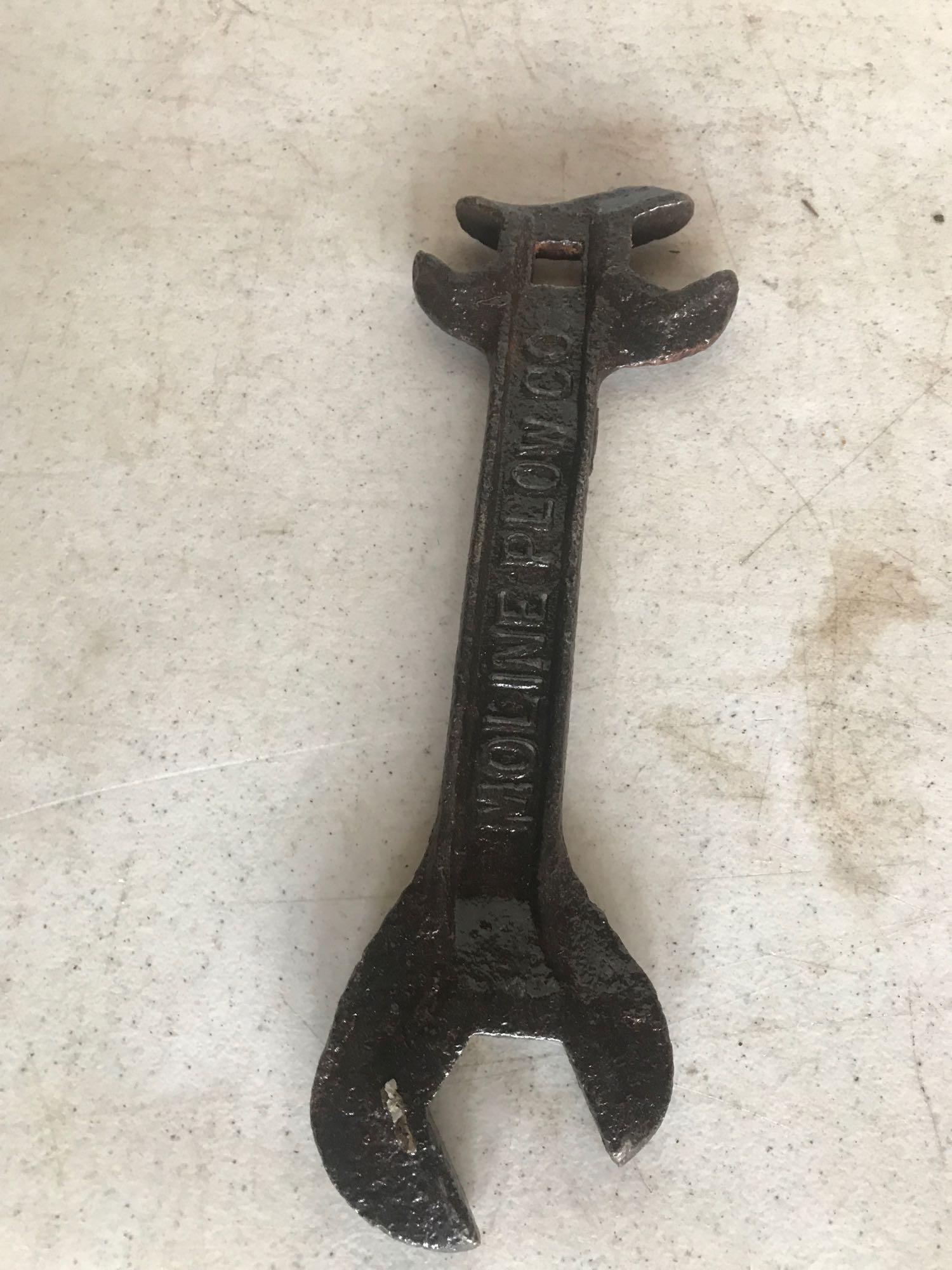 Various antique wrenches including: 2 rock island wrenches, 1 Gehl, 1 Moline plow Co., and 1 Letz