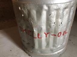 Antique gas can with handles advertised with Skelly Oil Co.