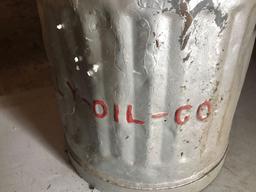 Antique gas can with handles advertised with Skelly Oil Co.