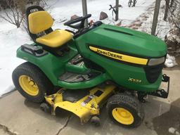 JD X534 4- wheel steer riding lawn mower,54 inch power lift deck, 343 hours, Kawasaki gas engine,