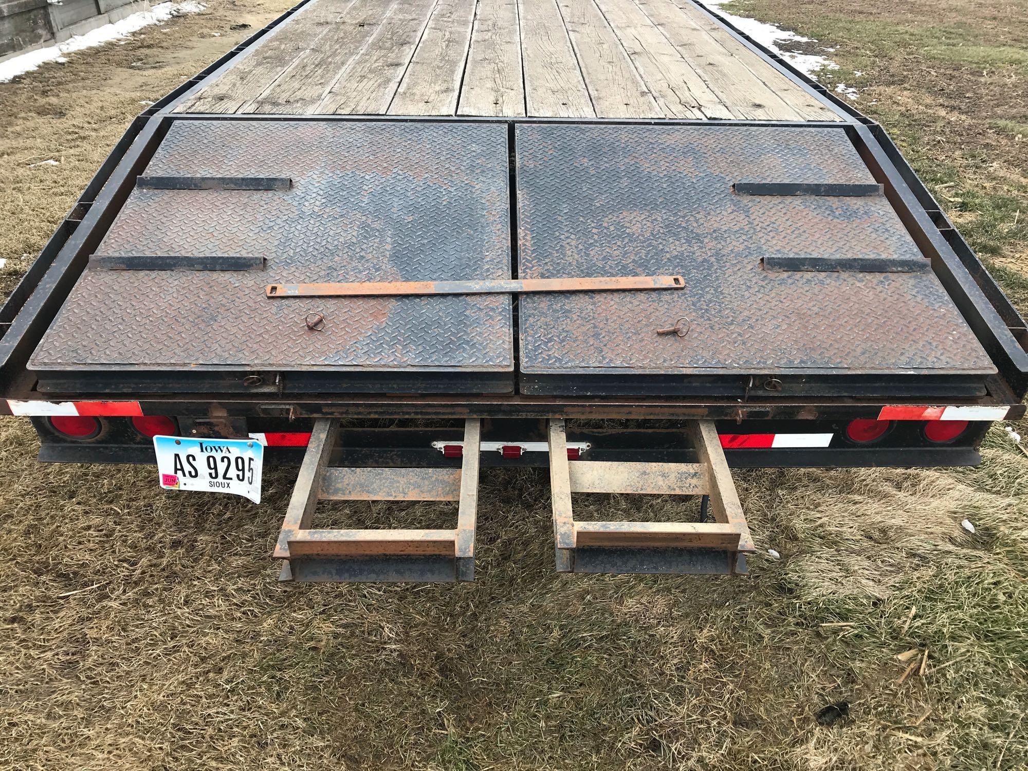 Road Boss 8' x 20' 5th-wheel trailer with 4' beaver tail and ramps. 14,000 lb dual axles with