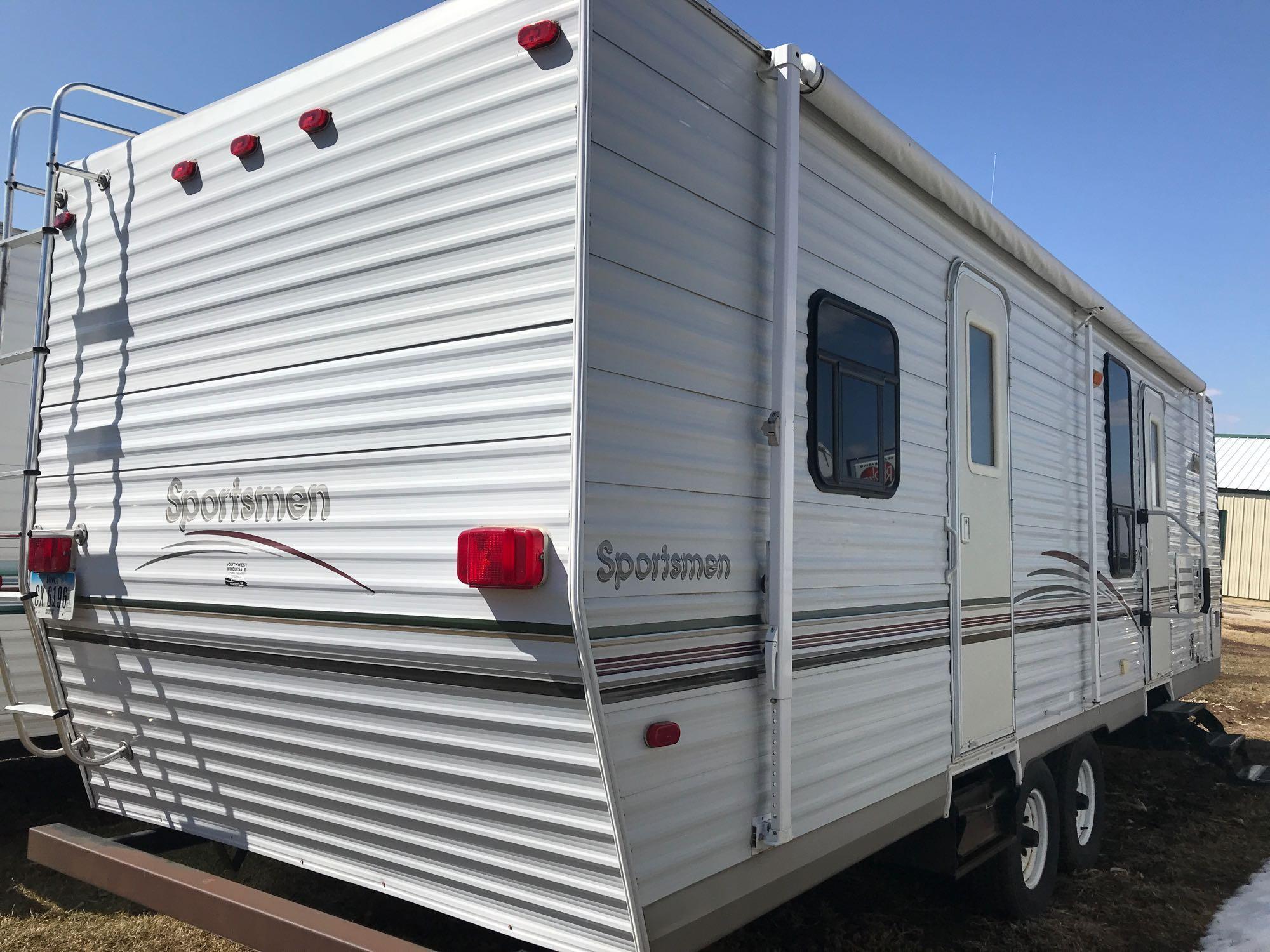 2001-30' Sportsmen pull type tandem axle camper with 2 walk-in doors, 2 slide outs, sleeps 4 with