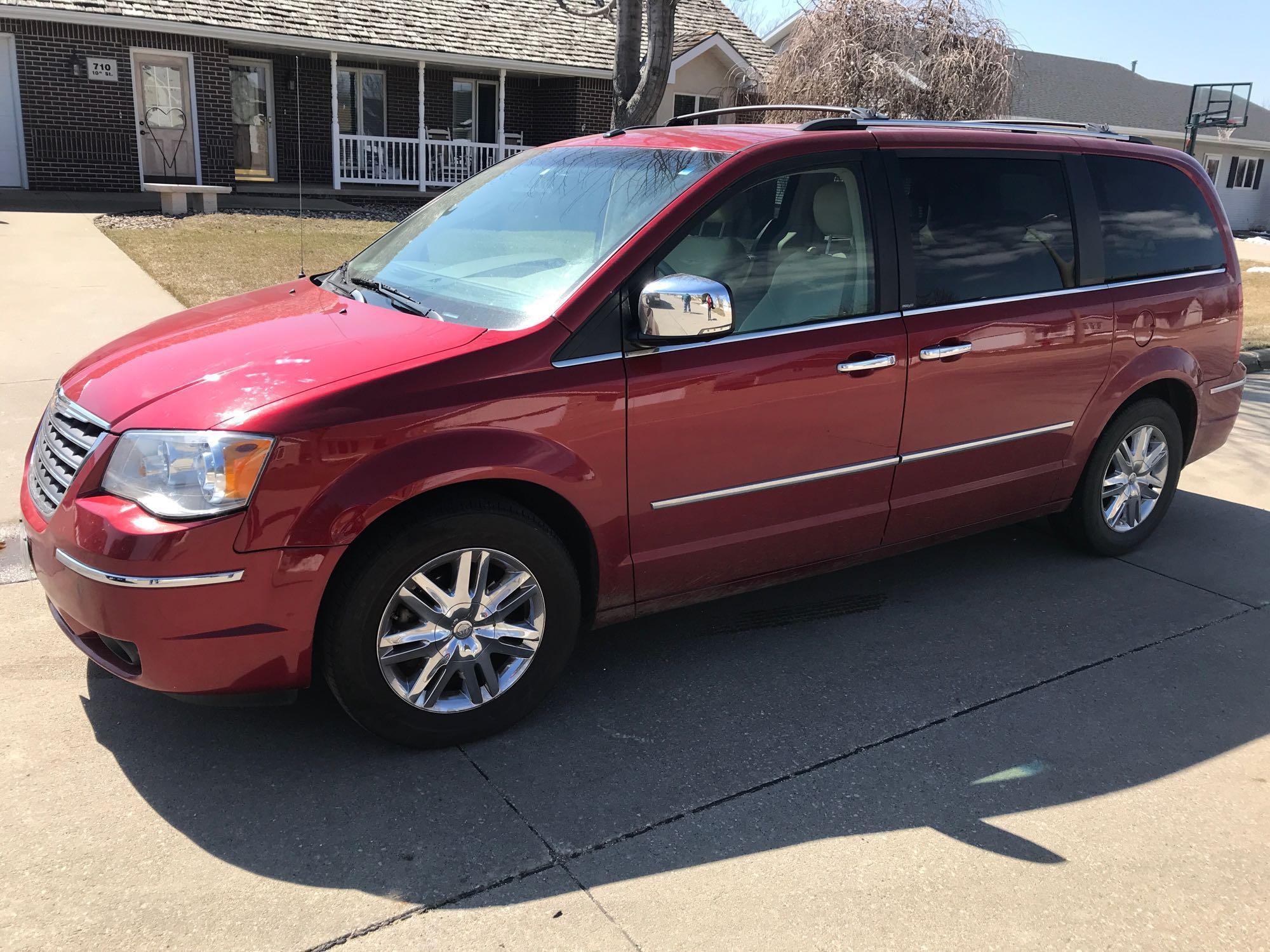 2008 Town and Country Chrysler van, red exterior color, light tan leather interior, automatic, power