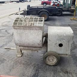 Portable mortar batch mixer electric motor belt drive with reduction gearbox.