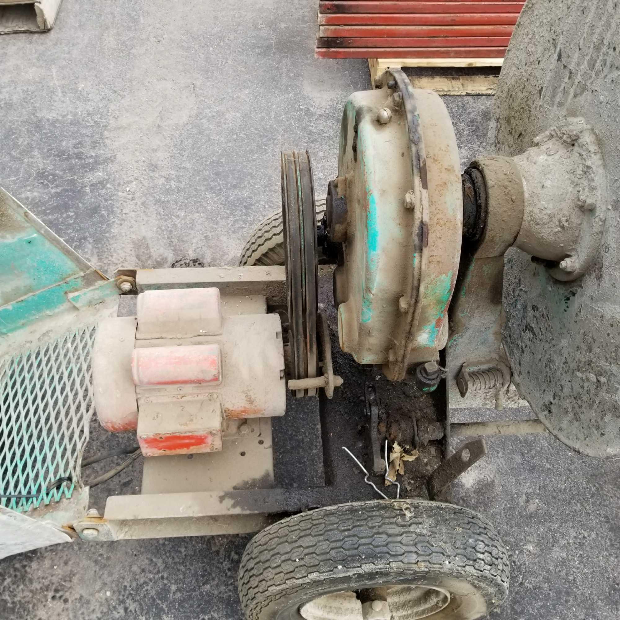 Portable mortar batch mixer electric motor belt drive with reduction gearbox.