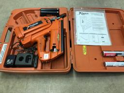 Battery powered Paslode impulse framing nailer with charger, batteries, and hard case. Works well!