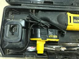 Cordless DeWalt variable speed reciprocating saw. Model DW938 with case, charger, and battery, plus