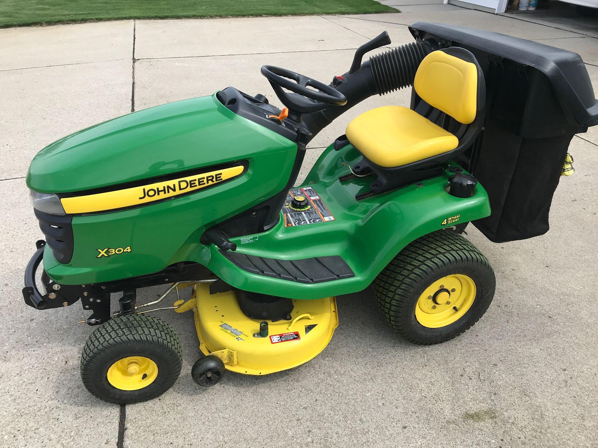 JD X304 4-wheel steer riding lawn mower, 42'' deck, bagger, 255 hours, Excellent condition, 1 owner