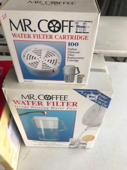 Sunbeam 4-place toaster, Mr. Coffee water filter and cartridge.