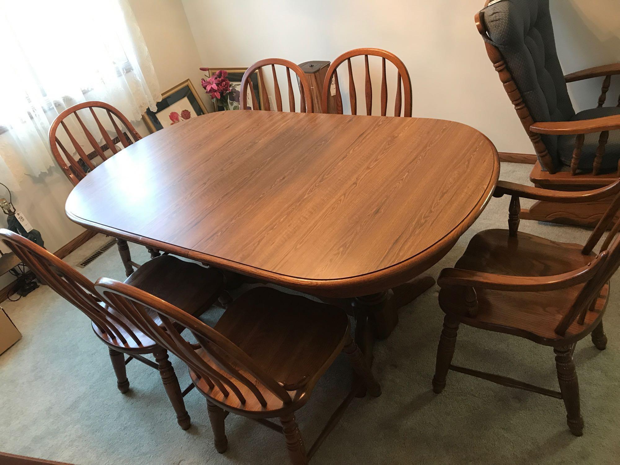 Beautiful 42'' x 62'' dining room table w/ (4) 10'' leaves, (6) chairs (2) captains, leaf storage