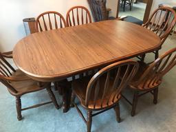 Beautiful 42'' x 62'' dining room table w/ (4) 10'' leaves, (6) chairs (2) captains, leaf storage