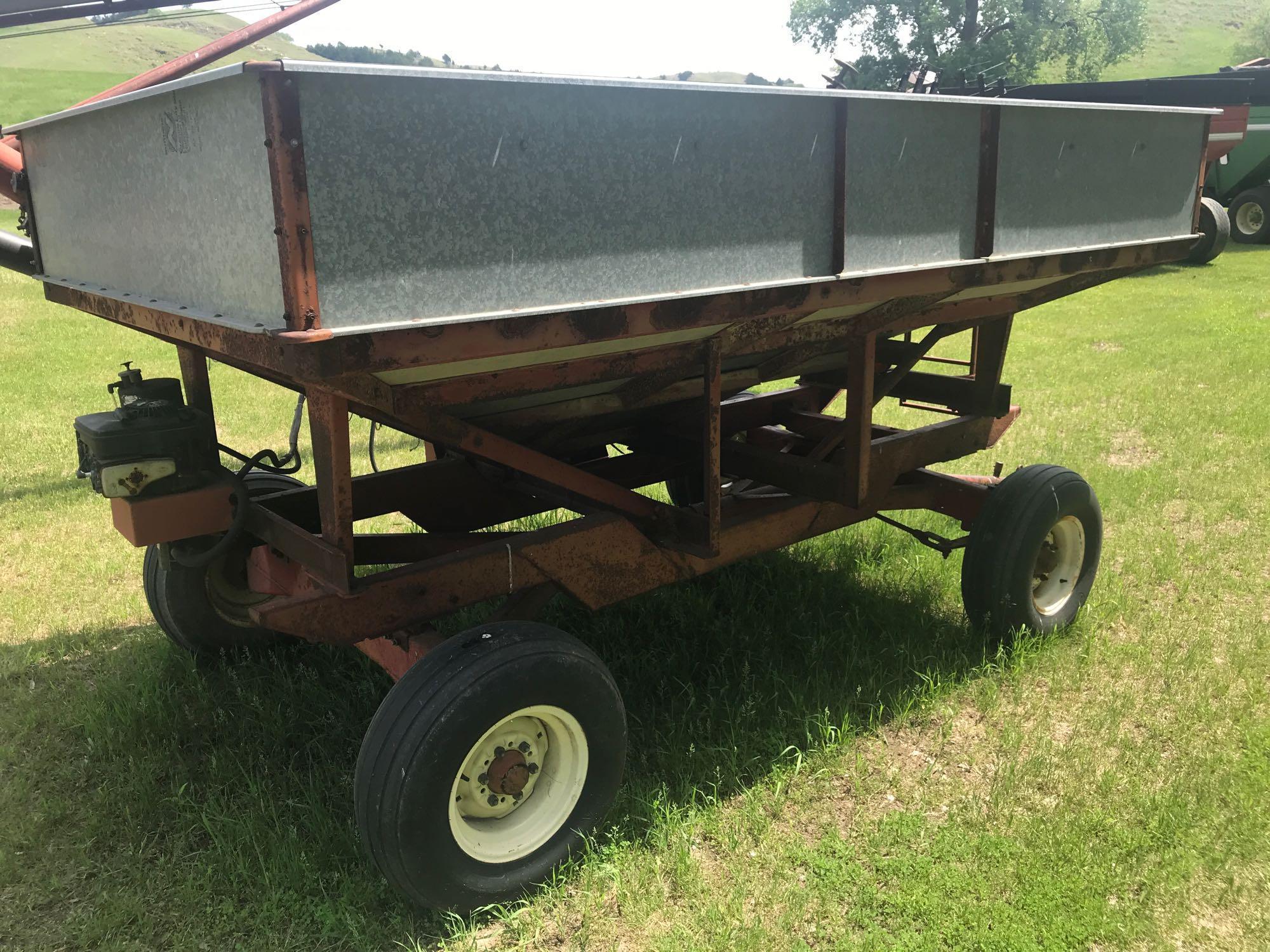 Heider 250 bushel seed tender gravity box w/ 6" auger and Briggs and Stratton 6 h.p. motor on