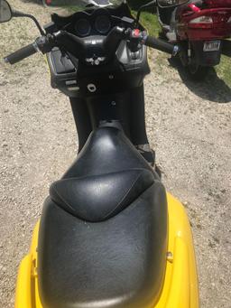 2003 Honda Reflex Scooter w/GIVI windshield, 7796 miles, yellow, ser.# JH2MF06163K100295