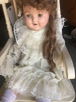 Vintage Doll and Rocking Chair. Bisque Head, Glass Eyes, and Cloth Body. Very Nice