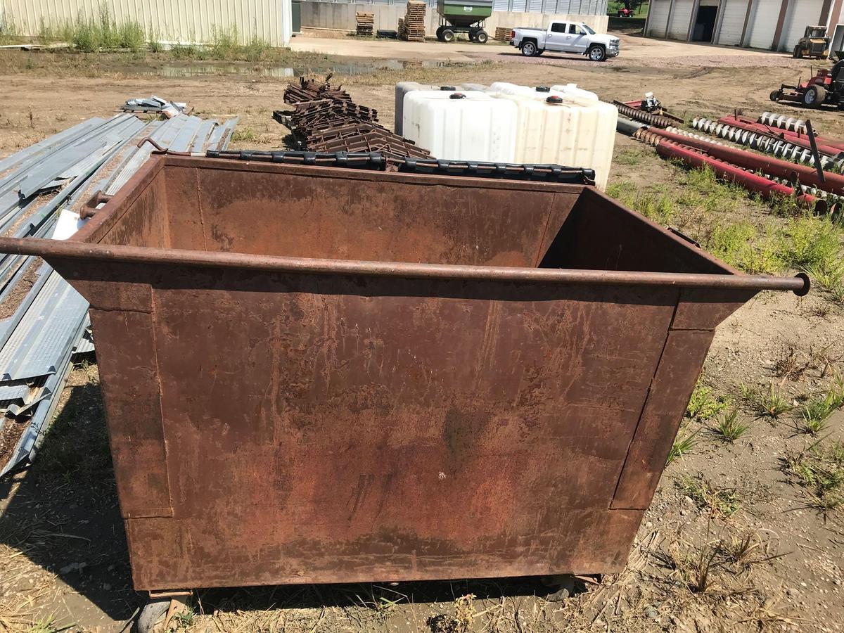 42'' x 64'' steel dumpster, average condition on flooring.