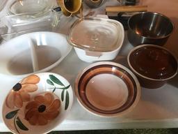 Misc. dishes, water pitcher, casserole dishes, flour sifter, and more.