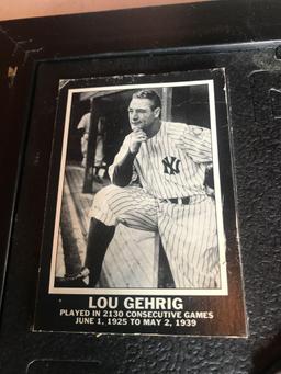 2 oval pictures of Elvis Presley, a framed print of Lou Gehrig (played in 2,130 consecutive games,