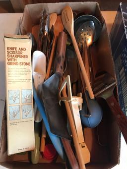 Various flatware, wood rolling pin, nut crackers, beer can opener, some advertising utensils, wooden