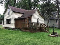 This residential home and garage is located directly across the street west of Dordt College in