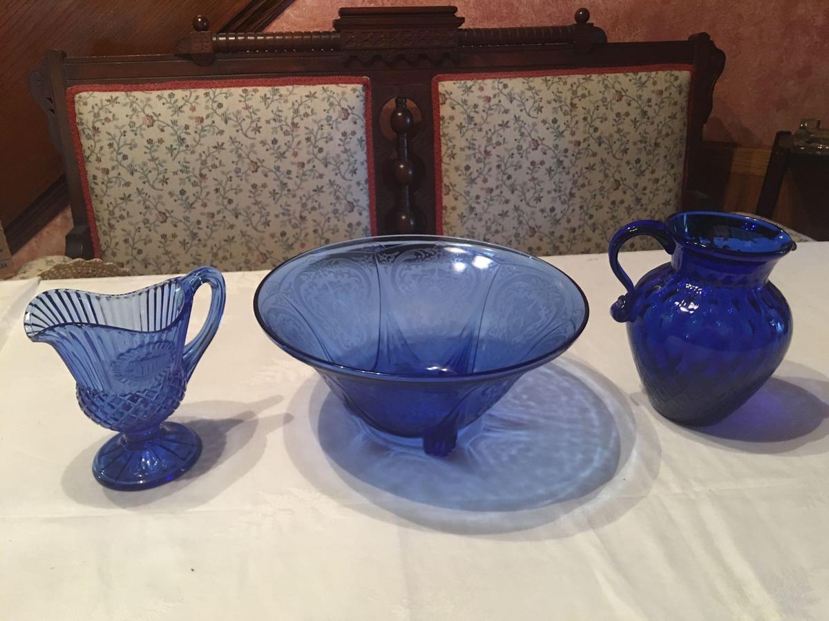 Cobalt blue 10" diameter by 4 1/2'' tall 3 footed etched bowl, 6 1/2'' and 5'' pitchers.