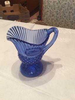 Cobalt blue 10" diameter by 4 1/2'' tall 3 footed etched bowl, 6 1/2'' and 5'' pitchers.