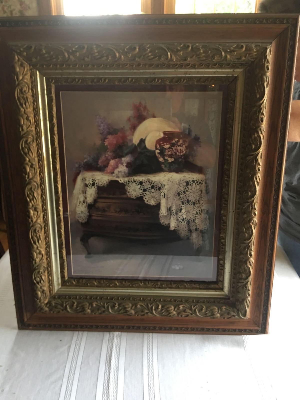 Very ornate oak frame with gold trim