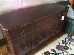 Mahogany buffet 20'' d, 63'' l, 35'' h, with silverware drawers, china storage, three drawer